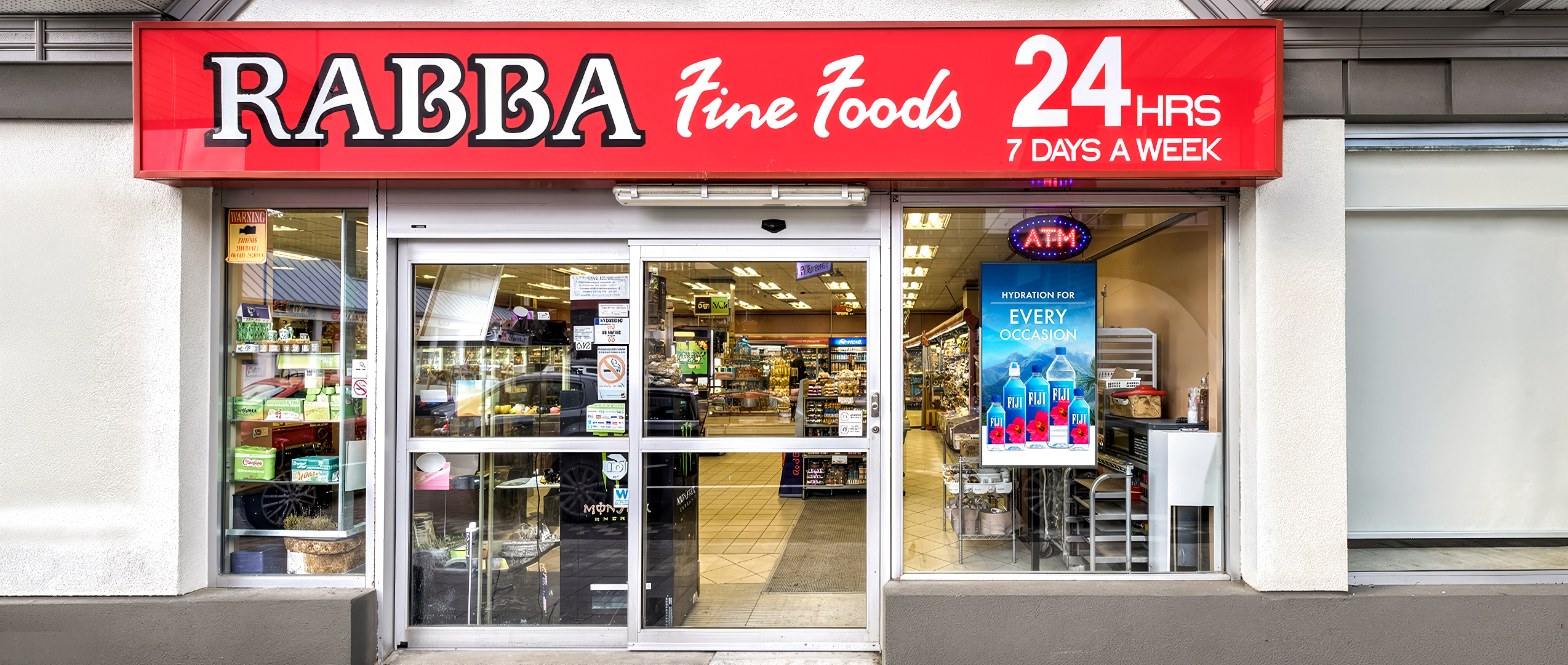 Hasty Market exterior with digital display